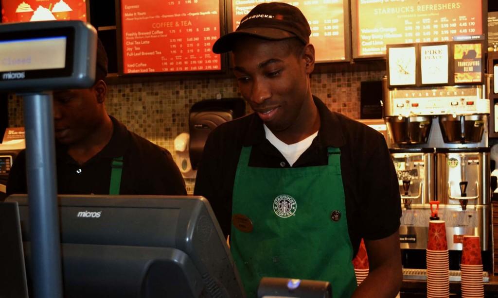 Java John serves up coffee and the occasional beat to customers at Starbucks. 