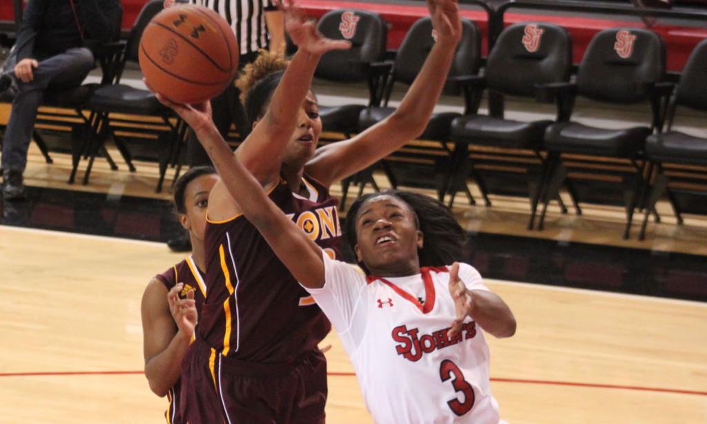 Aliyyah Handford cuts to the basket as a sets a career high 32 points against Iona. 