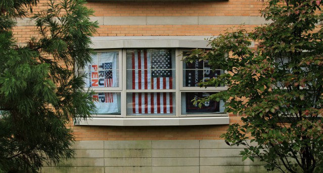 The students in a Century Hall suite have put up their flags supporting President-elect Donald Trump since his victory on Nov. 9, causing controversy on campus.