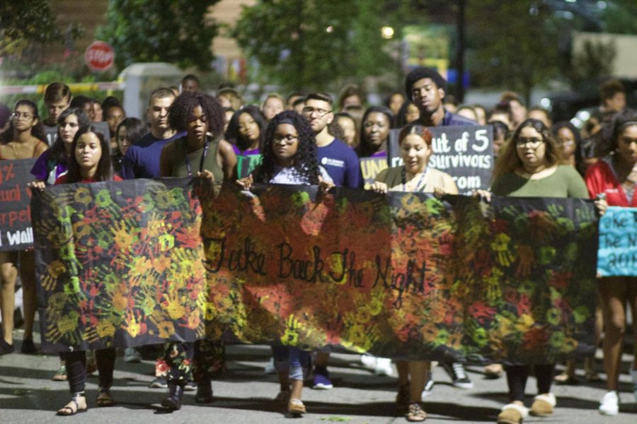 Students participating in Take Back The Night, an event that raised awareness for sexual assault, back in 2018. 