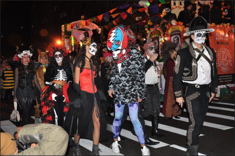 New Yorkers in costumes during Greenwich Village’s Halloween Parade of 2015 in NYC.
