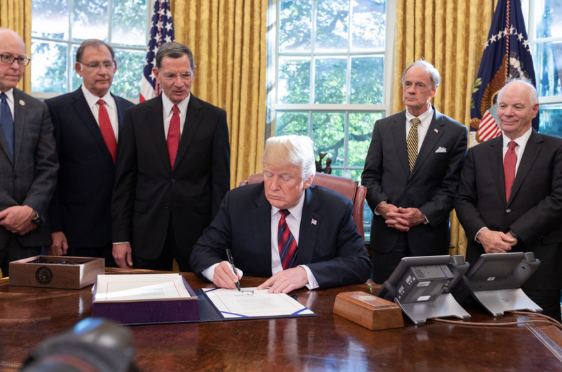  President Trump in the Oval Office signing the S. 3021-America’s Water Infrastructure Act of 2018, this past October.