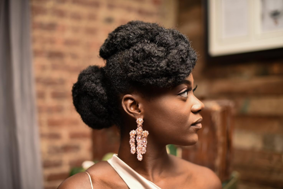 A side profile of senior Beverly Danquah showcasing her locs.