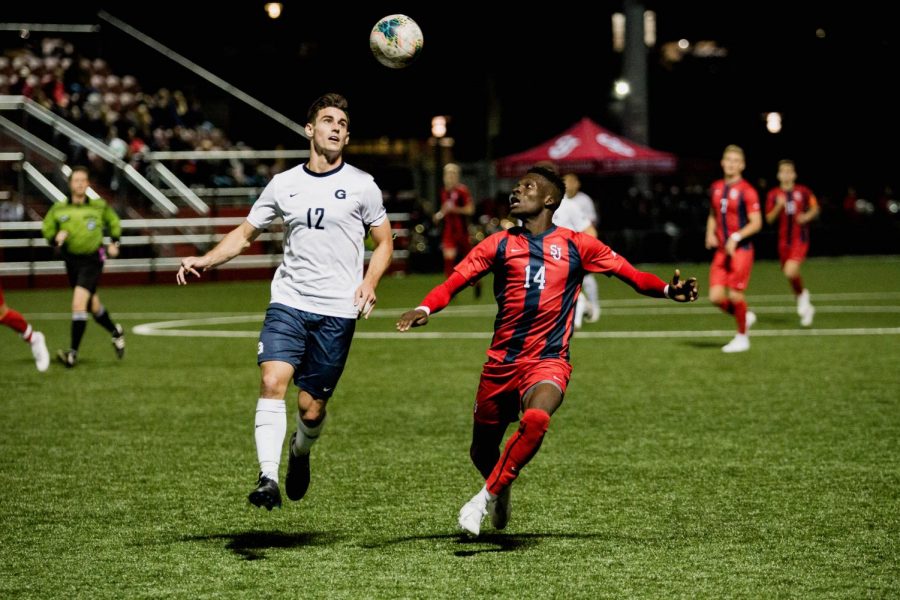 Tani Oluwaseyi fights for a ball during the Red Storm's 3-0 loss to Georgetown Wednesday night.