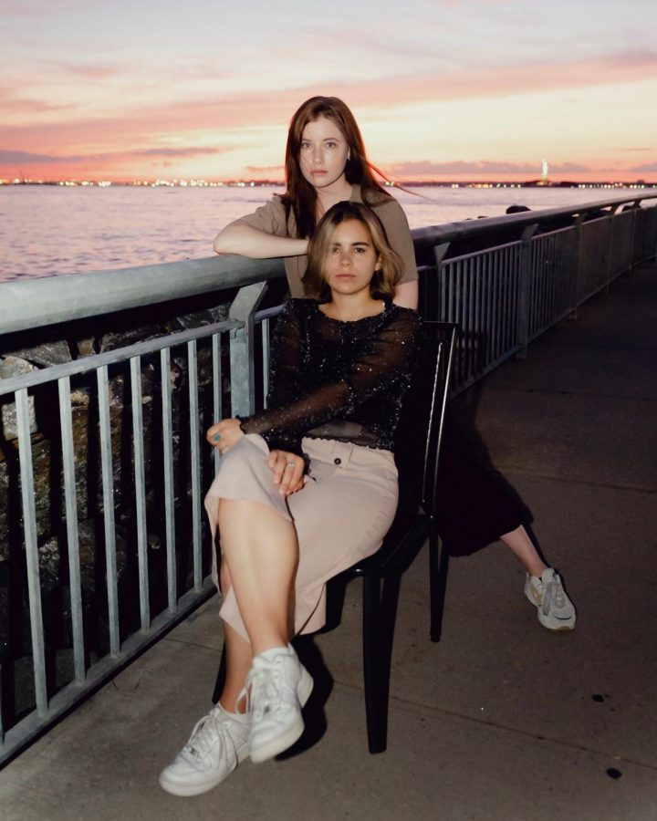 Ceci Sturman (sitting) and Hannah Pruzinsky (standing) co-created the indie music group, Sister, based in Brooklyn.
Photo Courtesy/Hanna Pruzinsky and Ceci Sturman
